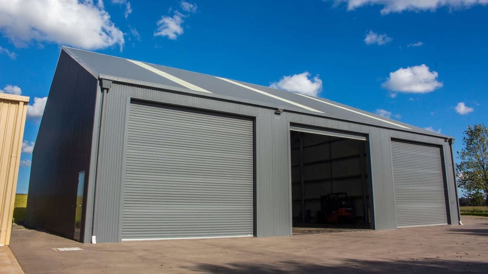 Workshop shed with roller doors